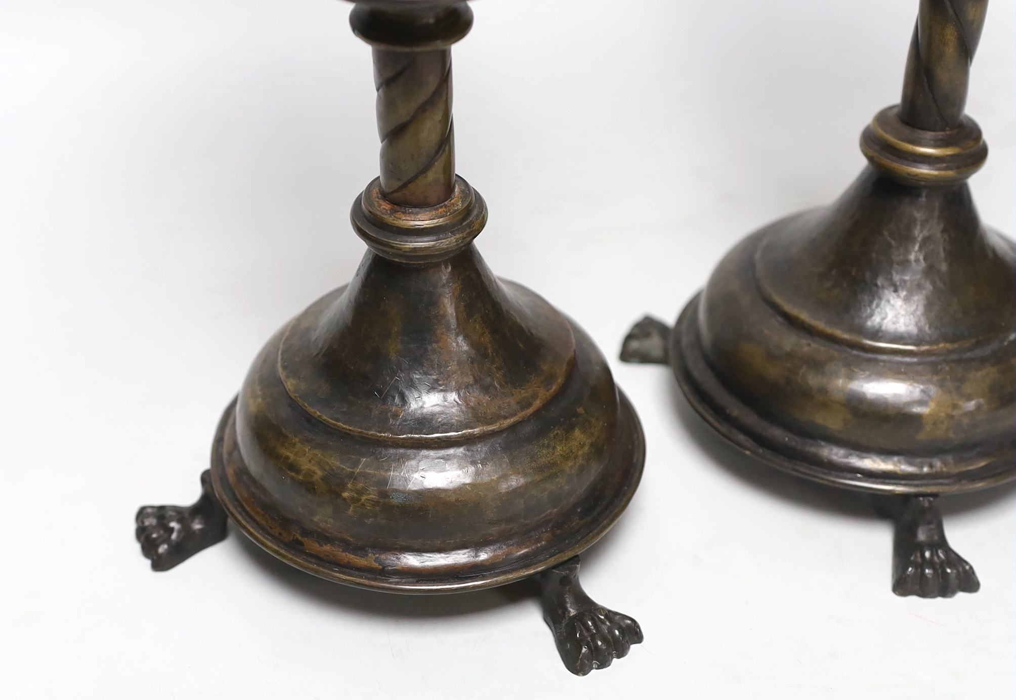 A pair of 19th century pricket candlesticks, 34cm